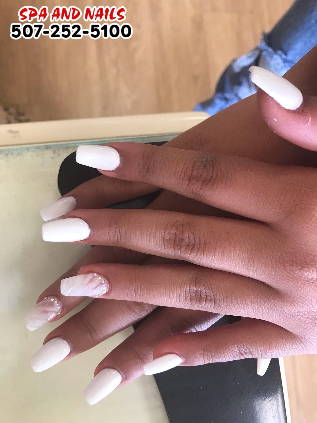 Simple, lowkey nails art designed by Spa & Nails Rochester